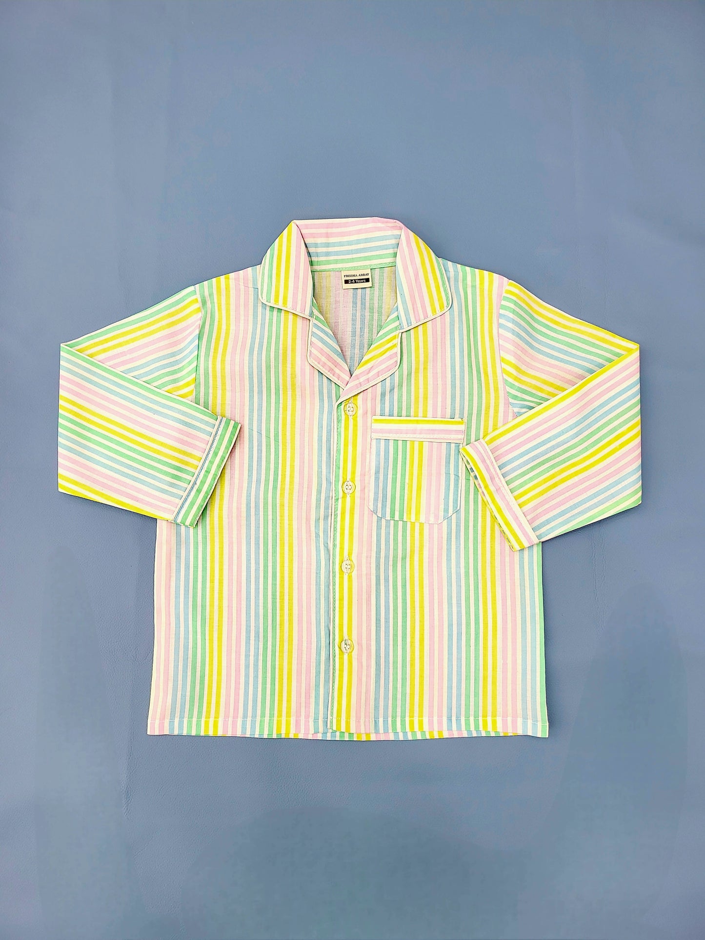 Dreamy white nightsuit with pastel rainbow color stripes and long sleeves for a cozy and restful sleep
