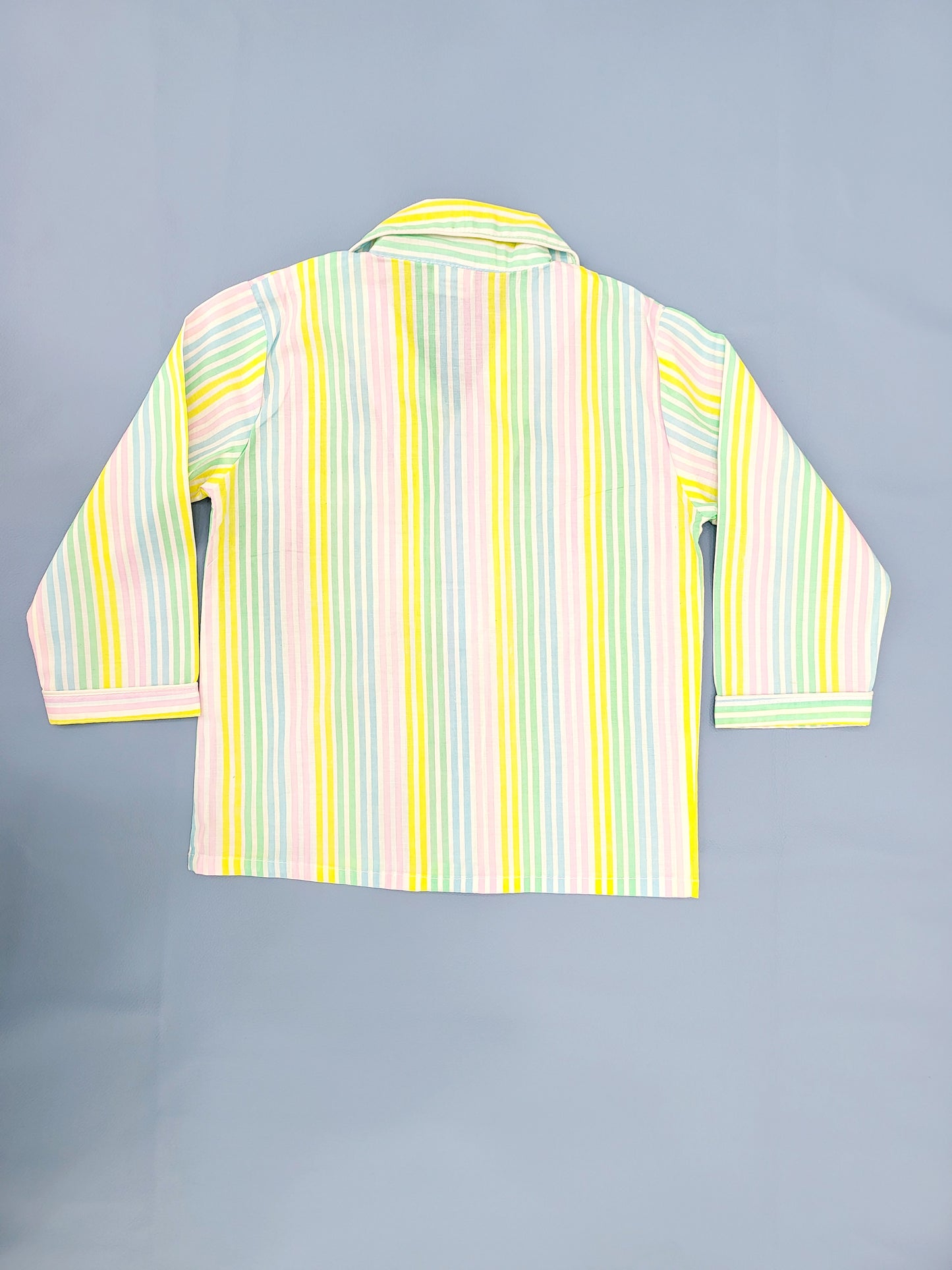 White full sleeve nightsuit with gentle rainbow colors and soft fabric for a peaceful night's sleep