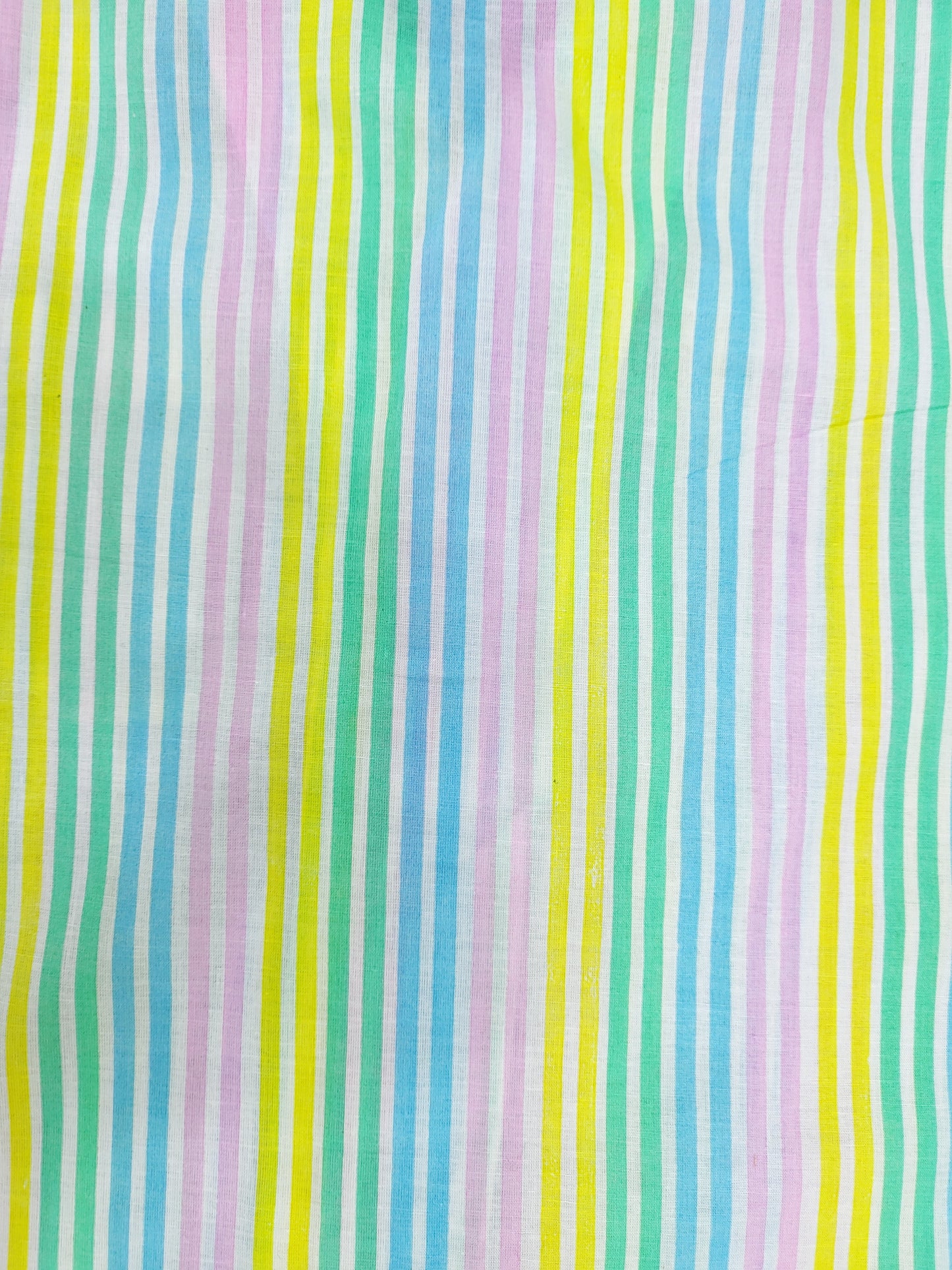 White nightsuit with soft pastel rainbow stripes and breathable fabric for a comfortable sleep