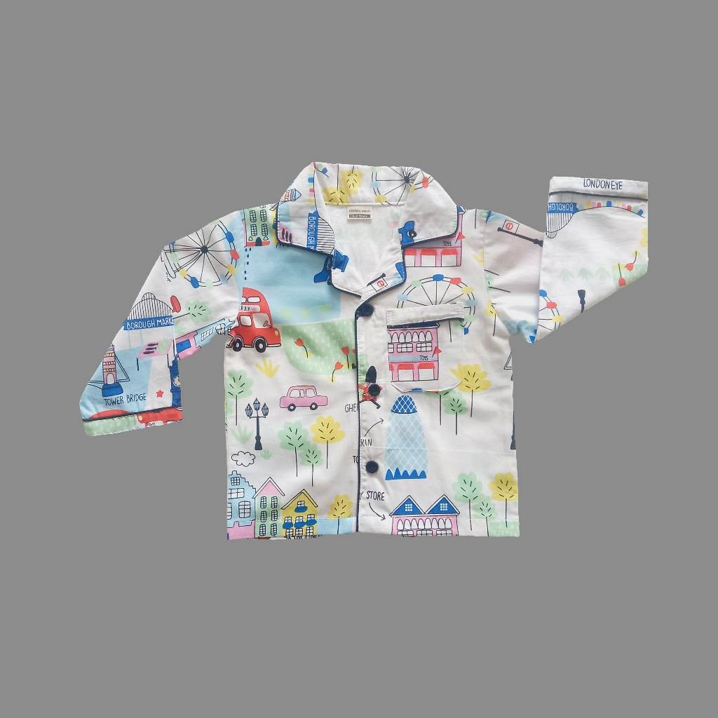 Kids' white nightsuit with fair theme, including wheels and cartoon characters, a unique and imaginative sleepwear option for ages 1-14 years