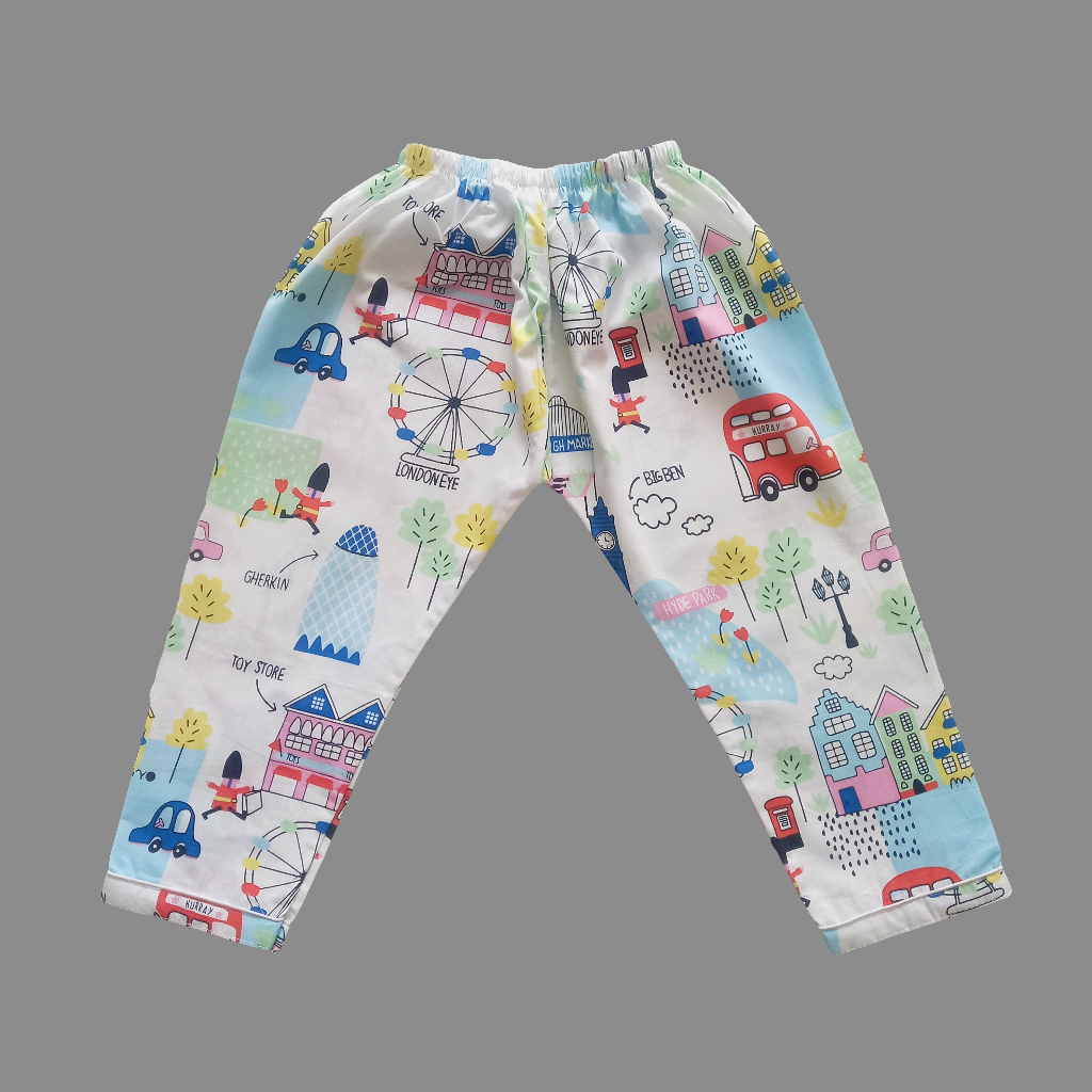 Fair print nightsuit in white, featuring colorful wheels and cartoons, perfect for kids who love to dream and imagine, aged 1-14 years, made from high-quality cotton