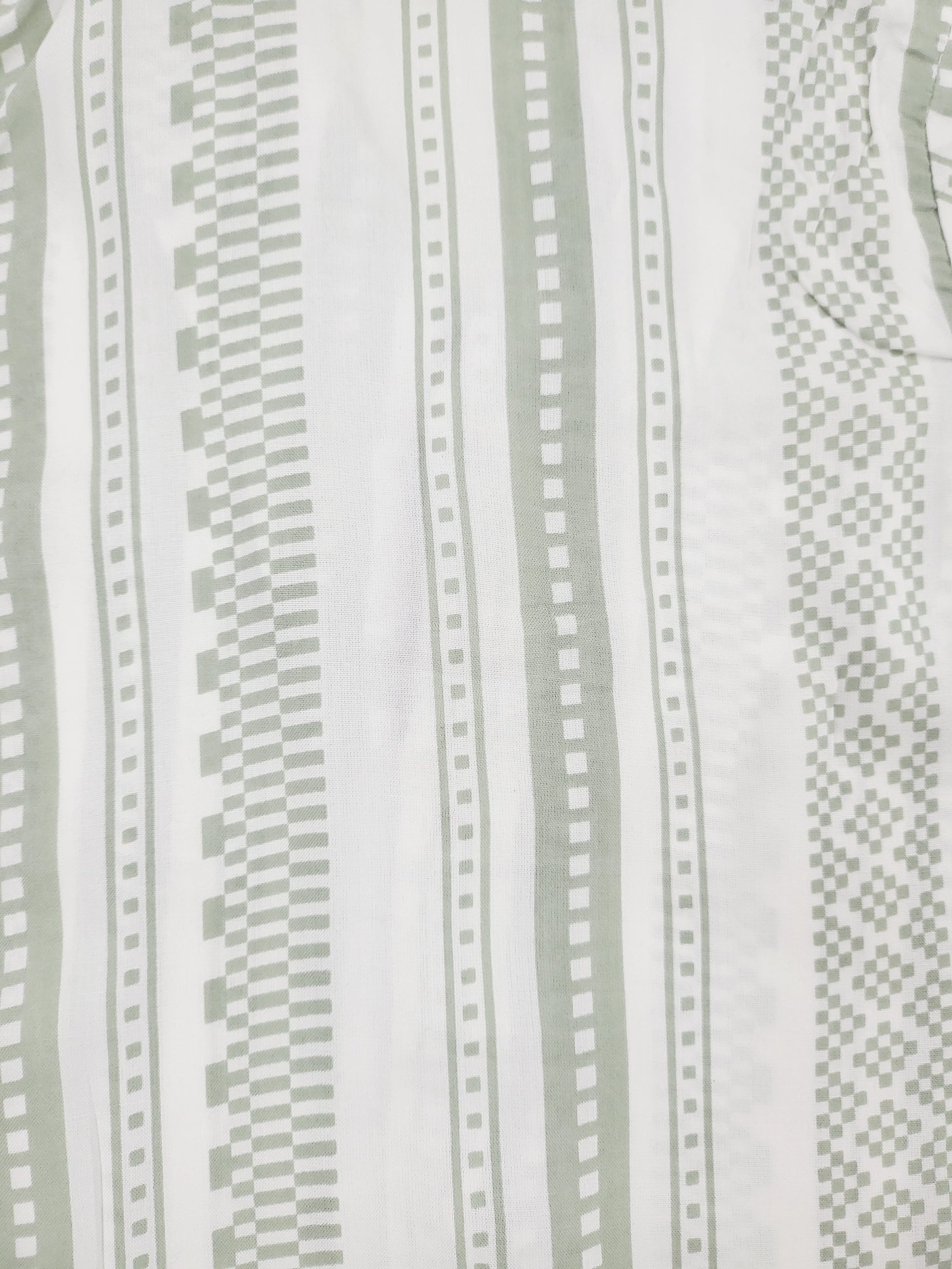 Calming and peaceful white unisex nightsuit with pastel mint color print, designed for kids aged 1-14 years, for a restful and comfortable sleep