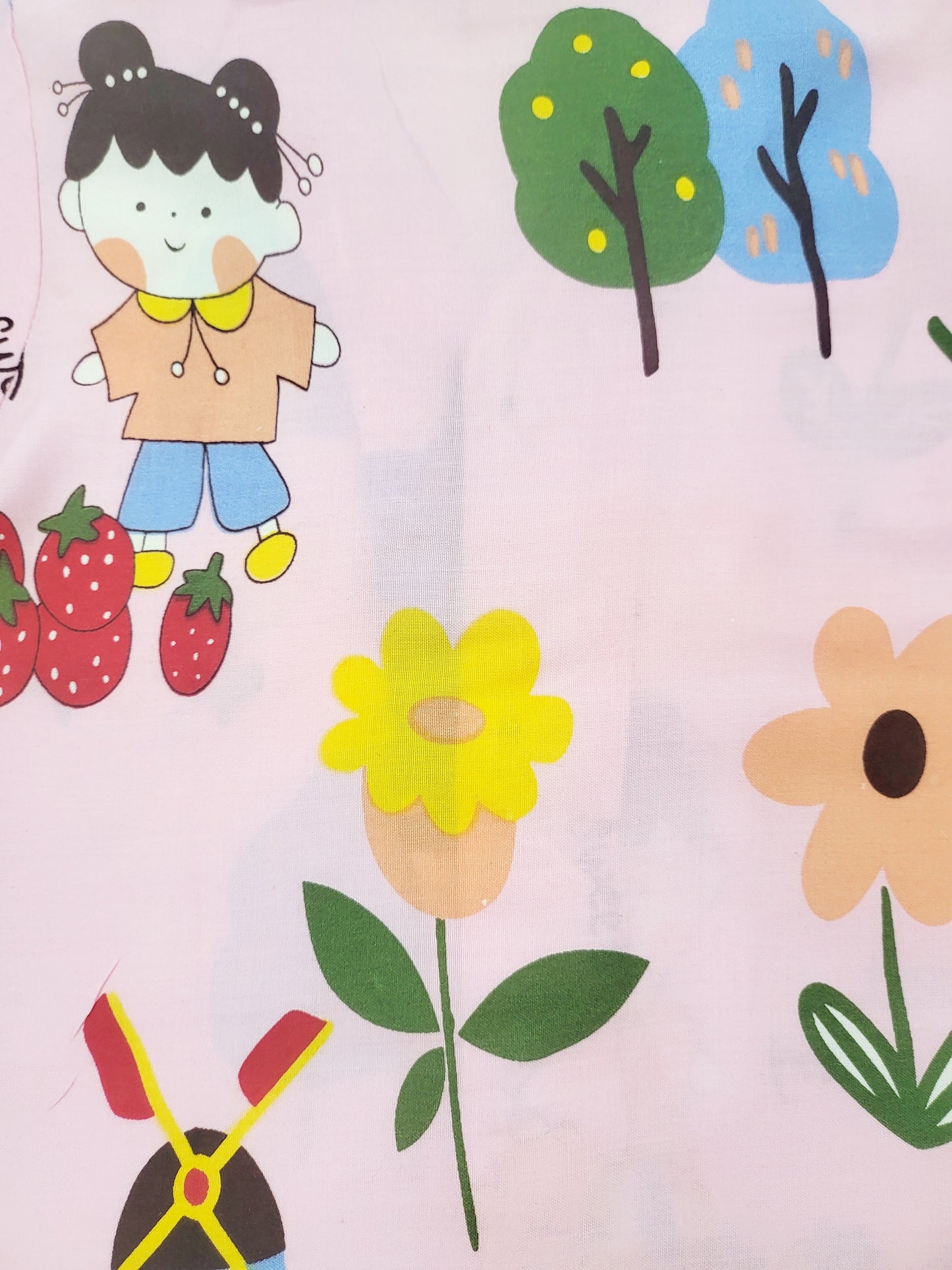 pink nightsuit with colorful doll print, featuring a beautiful and vibrant design, perfect for kids who love fashion and comfort, and want to sleep in style