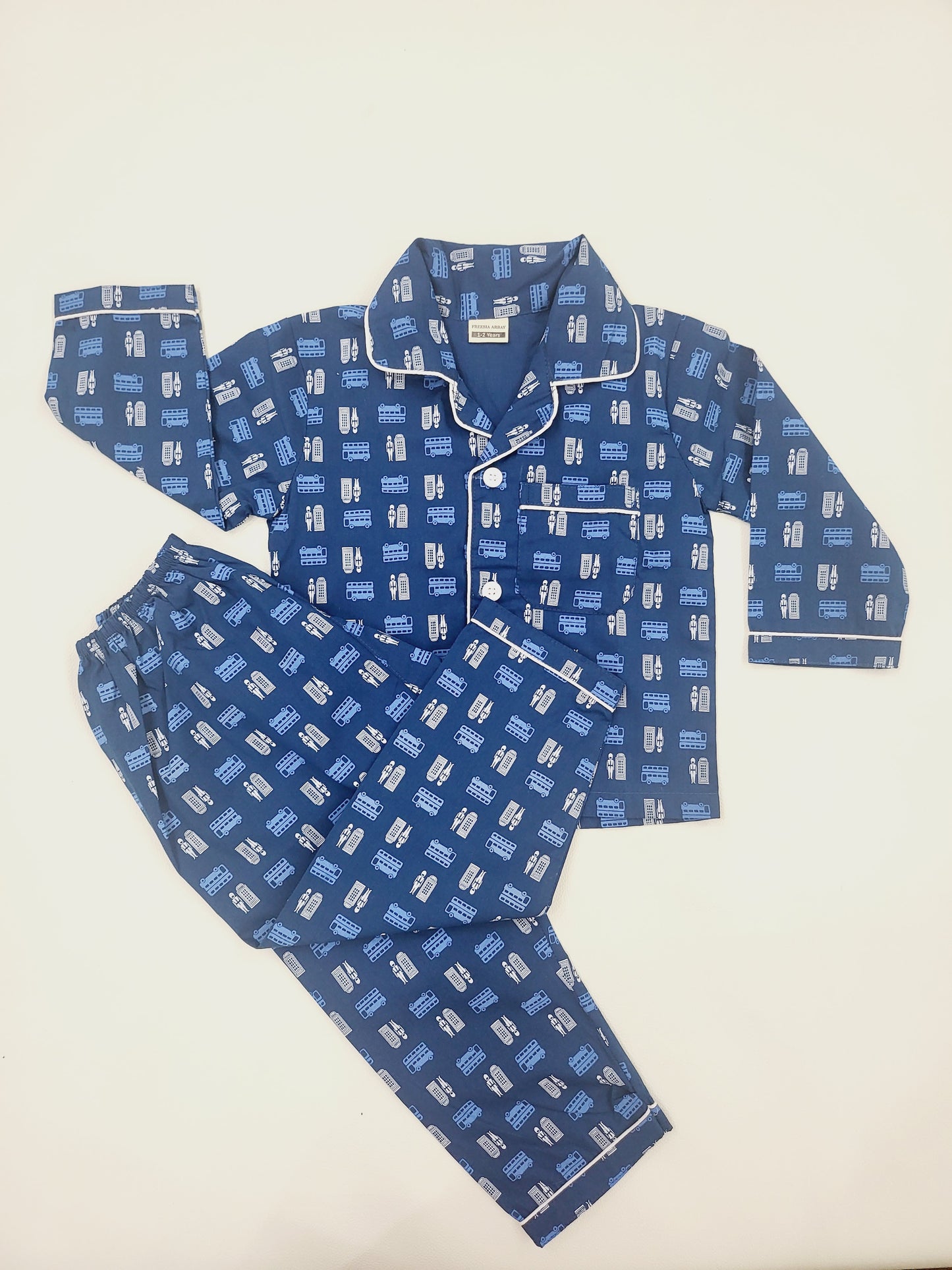 Fun and colorful blue cotton nightsuit with bus print, perfect for boys and girls aged 1-14 years who love vehicles and transportation