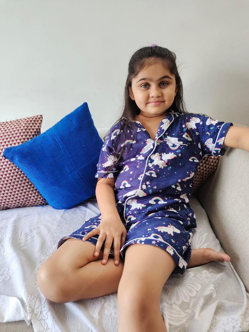 Shop Celebrity styles unicorn shorts set blue