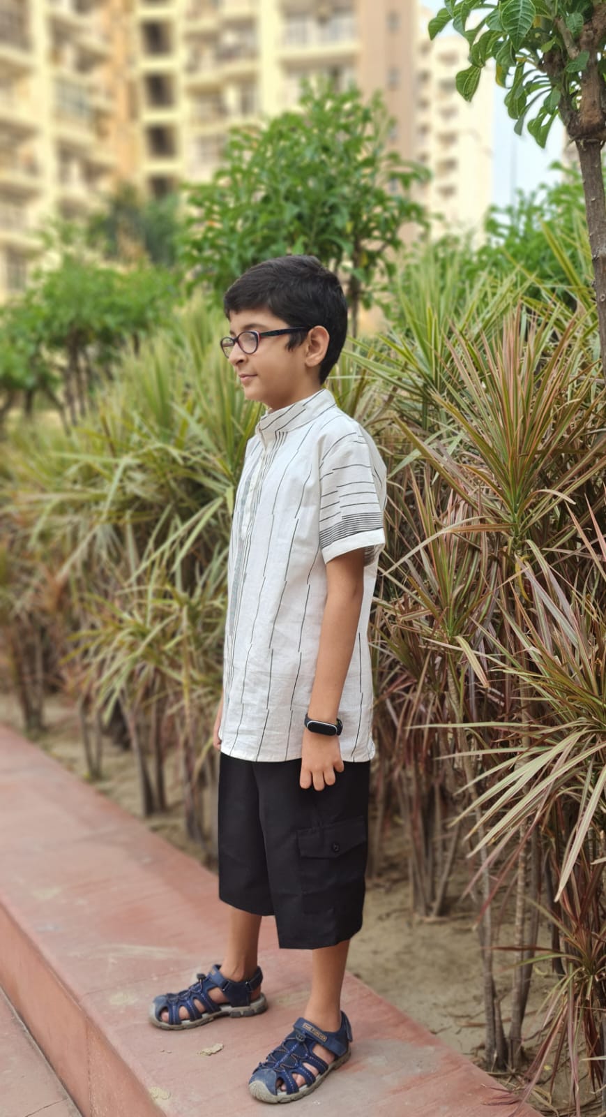 Freesia Array Asymmetrical striped Kurta shirt with Black Bermuda Shorts for Boys
