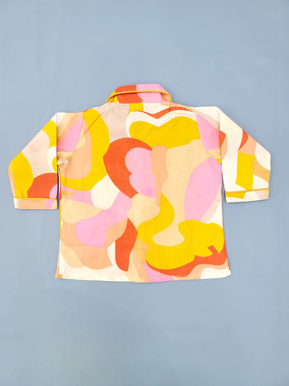 Colorful and playful nightsuit set for kids, featuring an abstract print with swirling patterns and vibrant colors, perfect for kids who love to express themselves