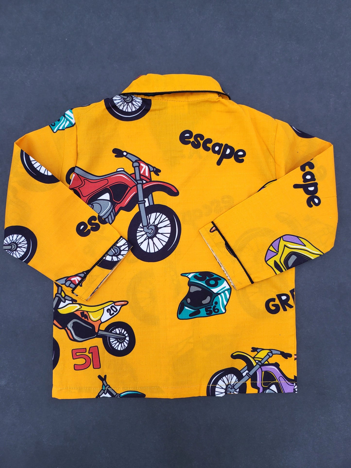 Comfortable and cozy yellow nightsuit with black bike print, suitable for kids of all ages, from 0 to 14 years