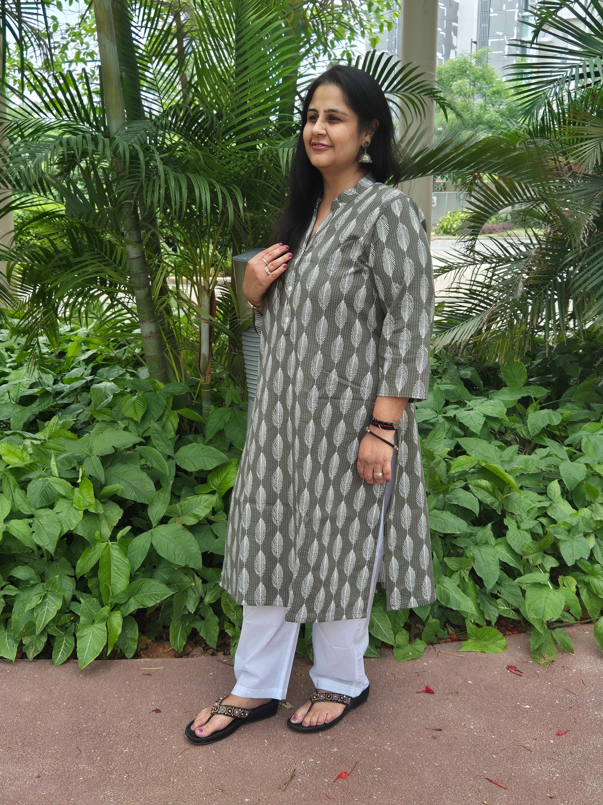 send gifts to India ladies olive green leaf print kurta with white pants premium set