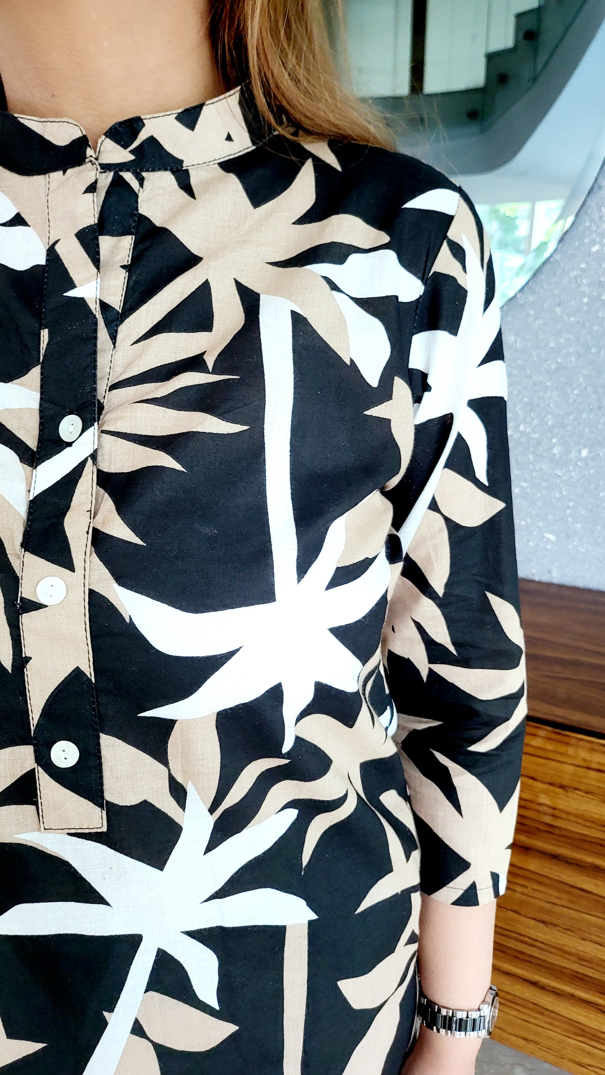 Stylish women’s cotton kurta in black with tropical leaf design
