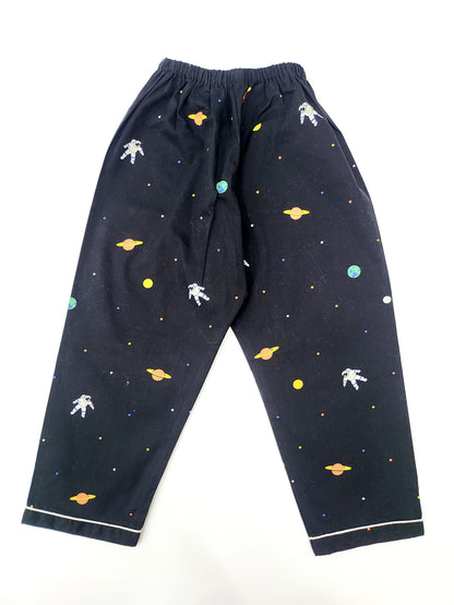 Black nightsuit with vibrant astronaut and space shuttle print for young space enthusiasts